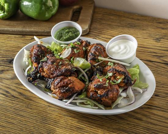 Delhi Garden Indian Restaurant signature dishes Chicken Tikka KebabSeekh KebabTandoori Chicken﻿﻿﻿﻿